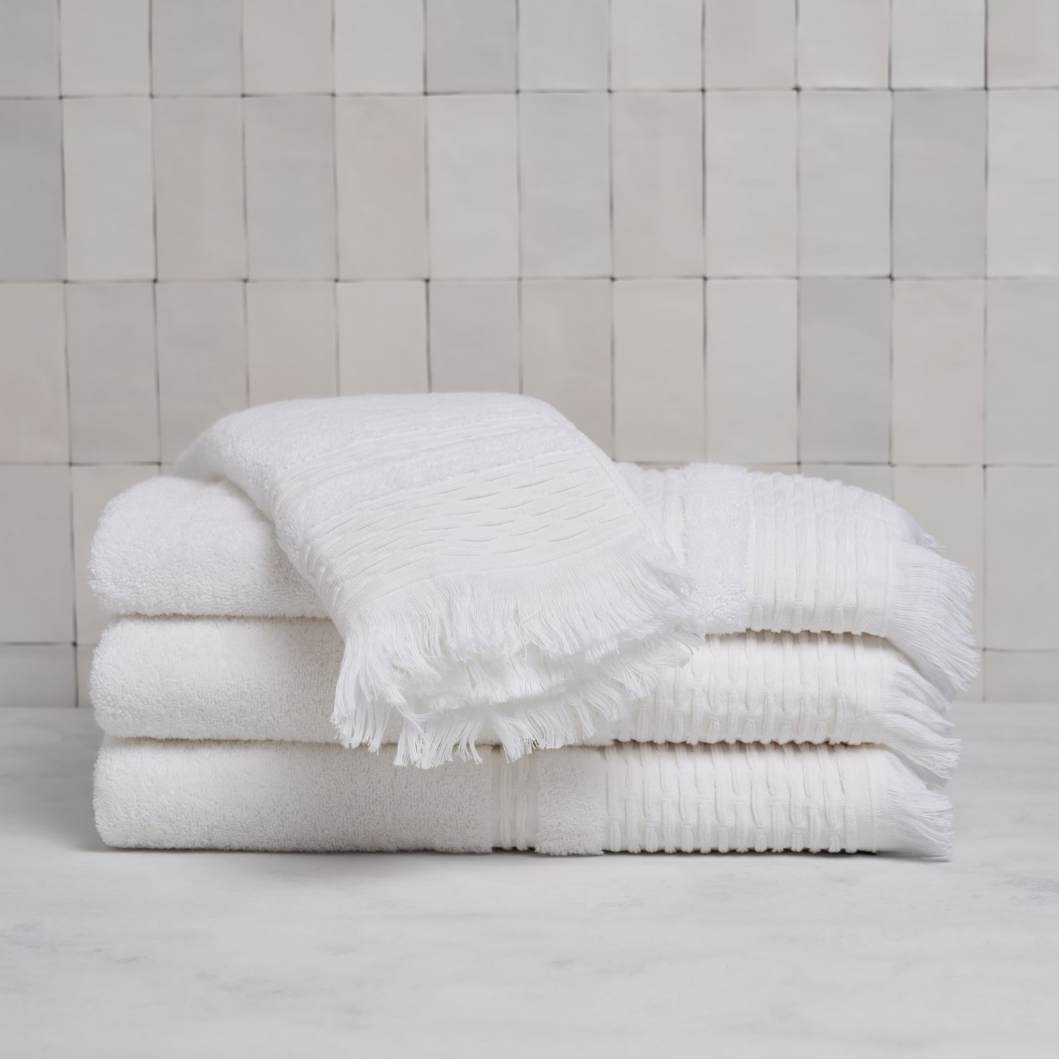 Set dos toallas de mano premium con guarda labrada y flecos, 100% algodón  620gr/m2, tamaño 50x80cm. - Tienda Hohos